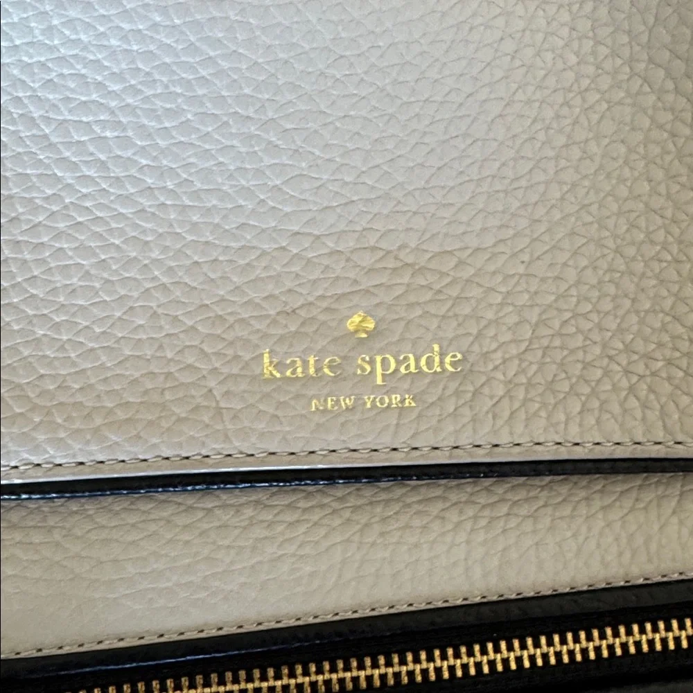 Kate Spade Chester Street Kacy Moussefrost with black accent and tassel backpack